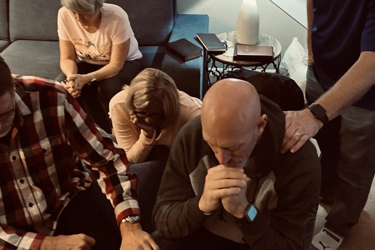 Pastors praying together